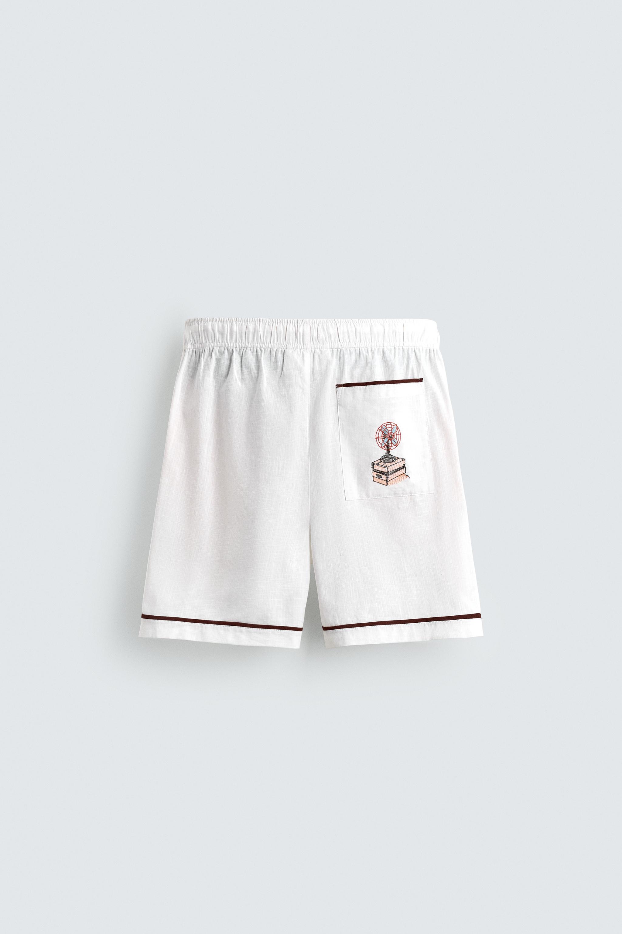 RELAXED FIT CONTRAST EMBROIDERY SHORTS